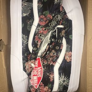 Black floral hi top vans
